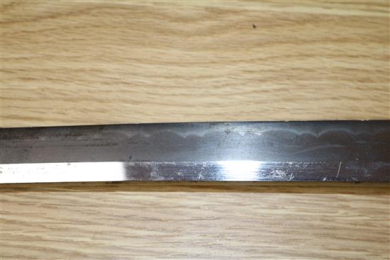 A WW2 Japanese katana with standard mounts, the blade with wavy hamon 98cm